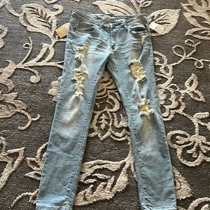 Light blue ripped skinny jeans